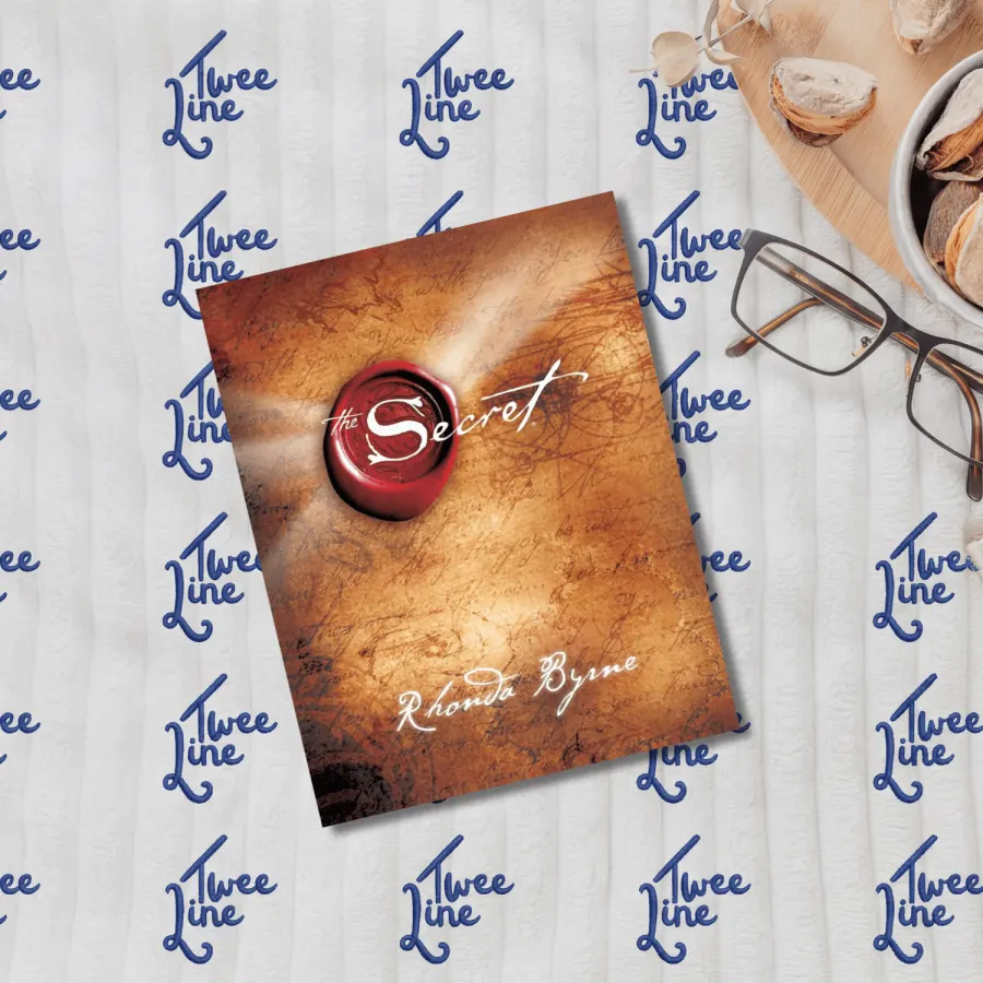 The Secret book cover with a red seal and gold accents