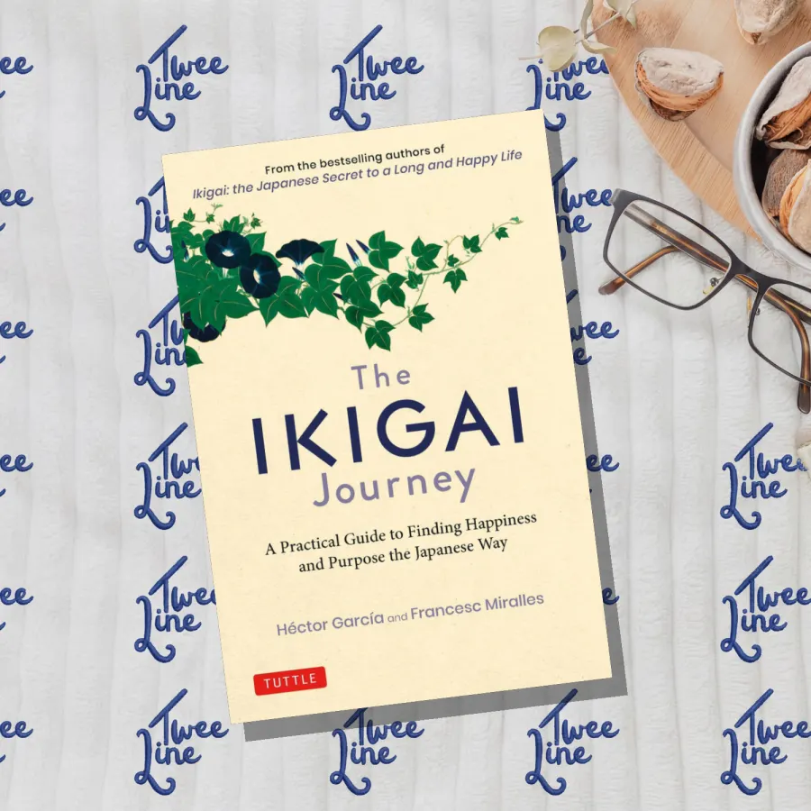 The Ikigai Journey book cover with a red sun and Japanese-inspired design