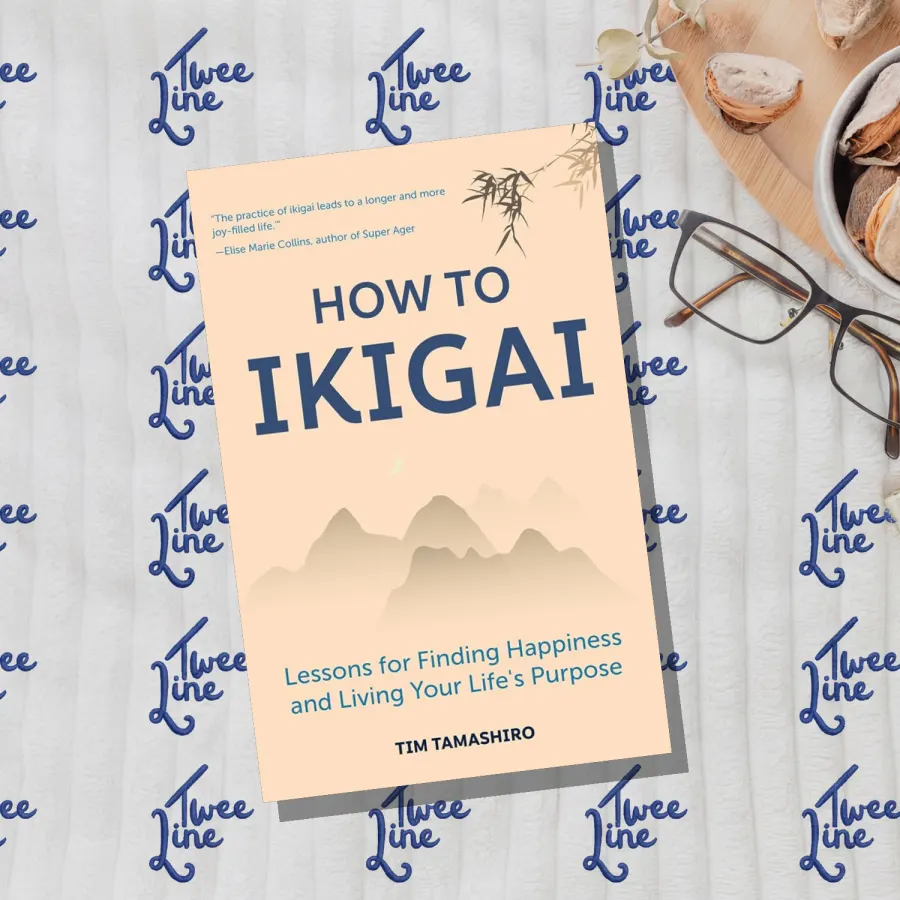 How to Ikigai book cover with Japanese-inspired design and cherry blossoms